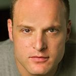 Headshot of actor Larry Mitchell, former Barrow Group student